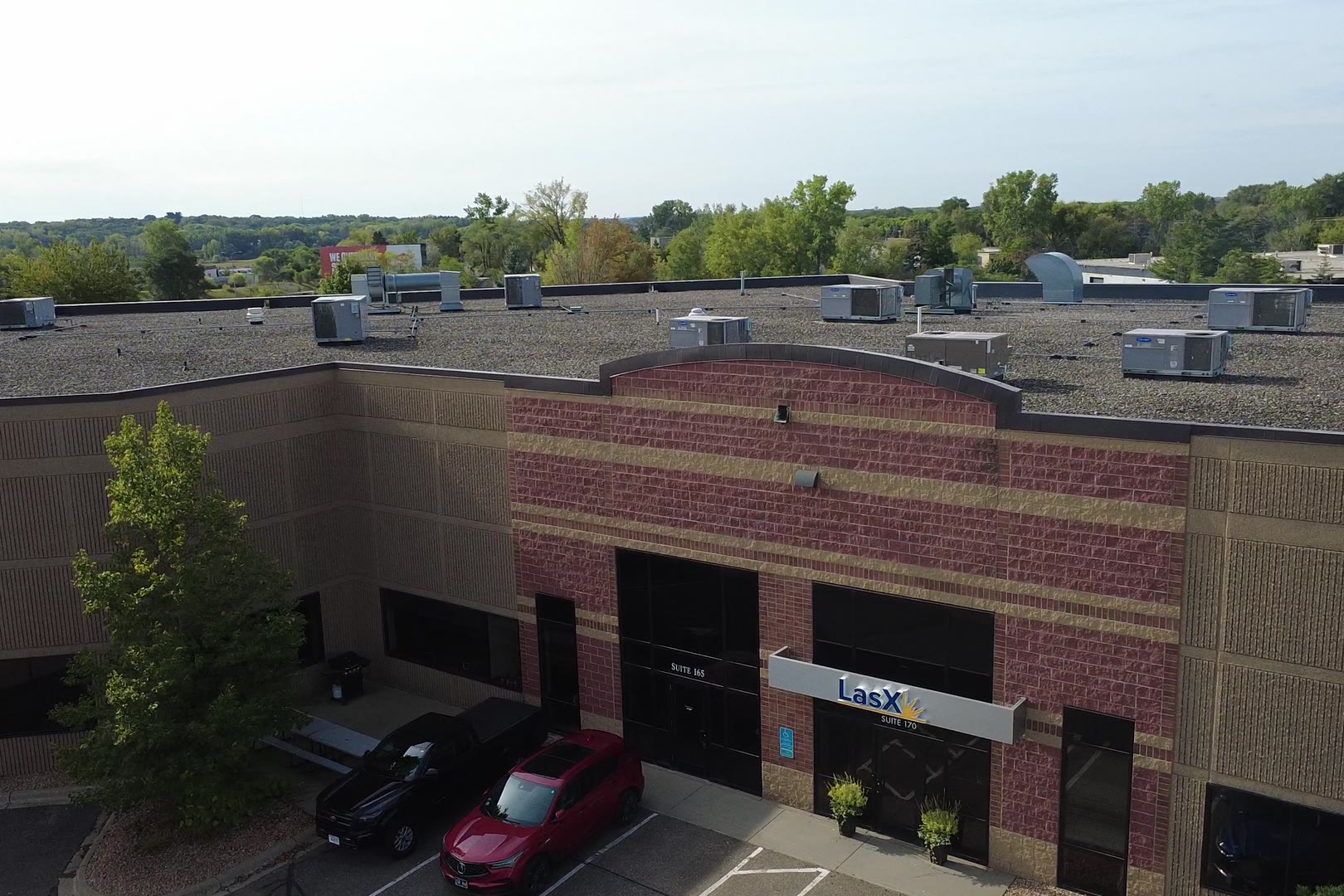 Aerial view of the LasX entrance and parking lot
