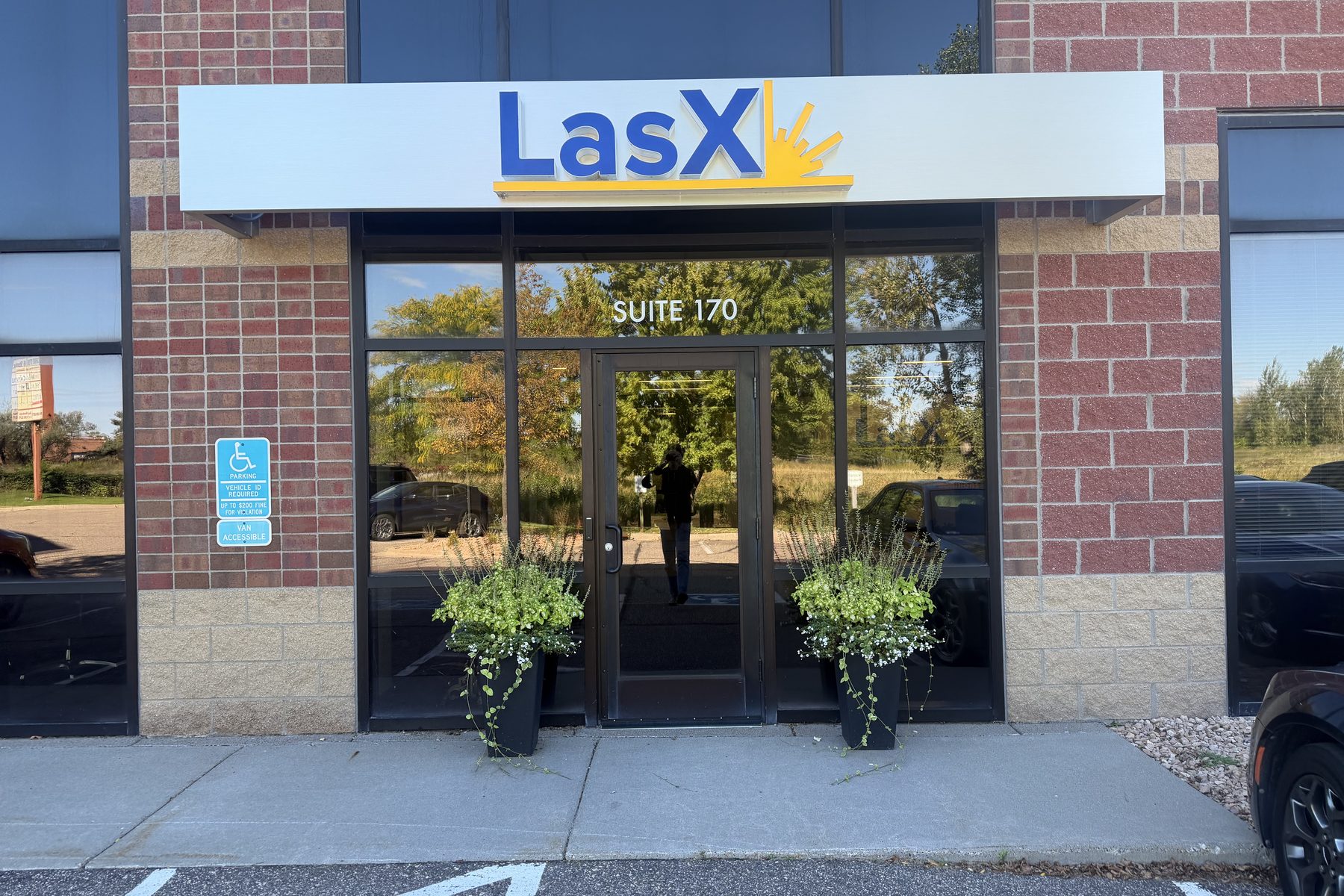 The LasX front entrance at Suite 170, with the LasX sign above the door