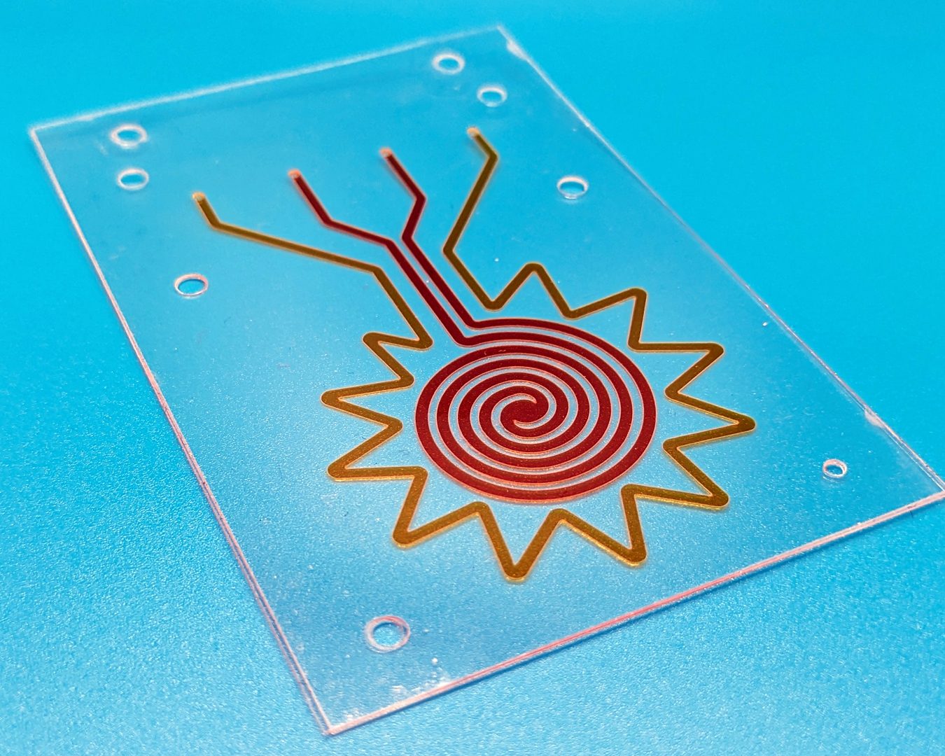 Spiral microfluidic chip with dye in the channels