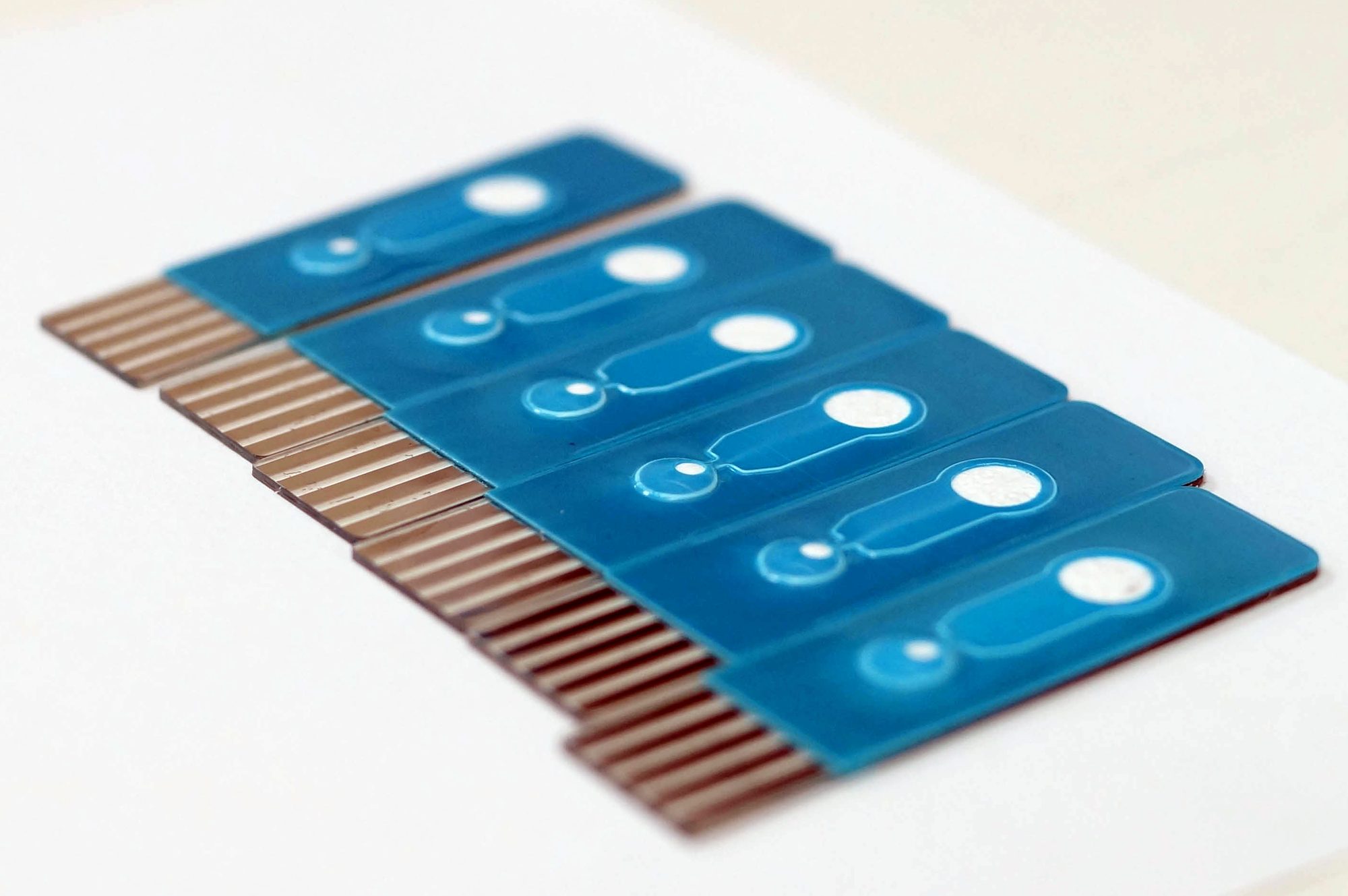 Row of diagnostic test strips
