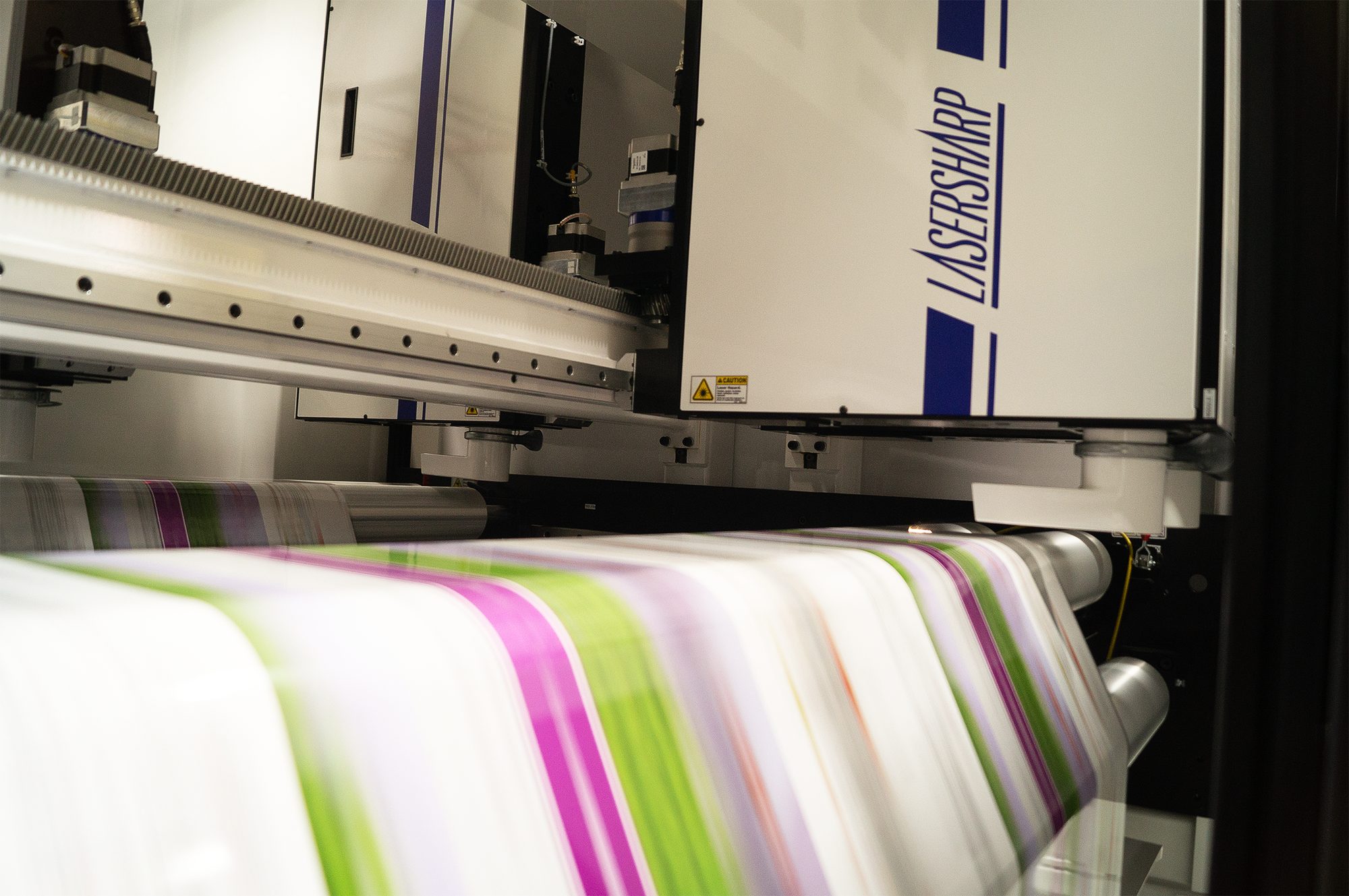 LaserSharp processing module over a printed flexible packaging web