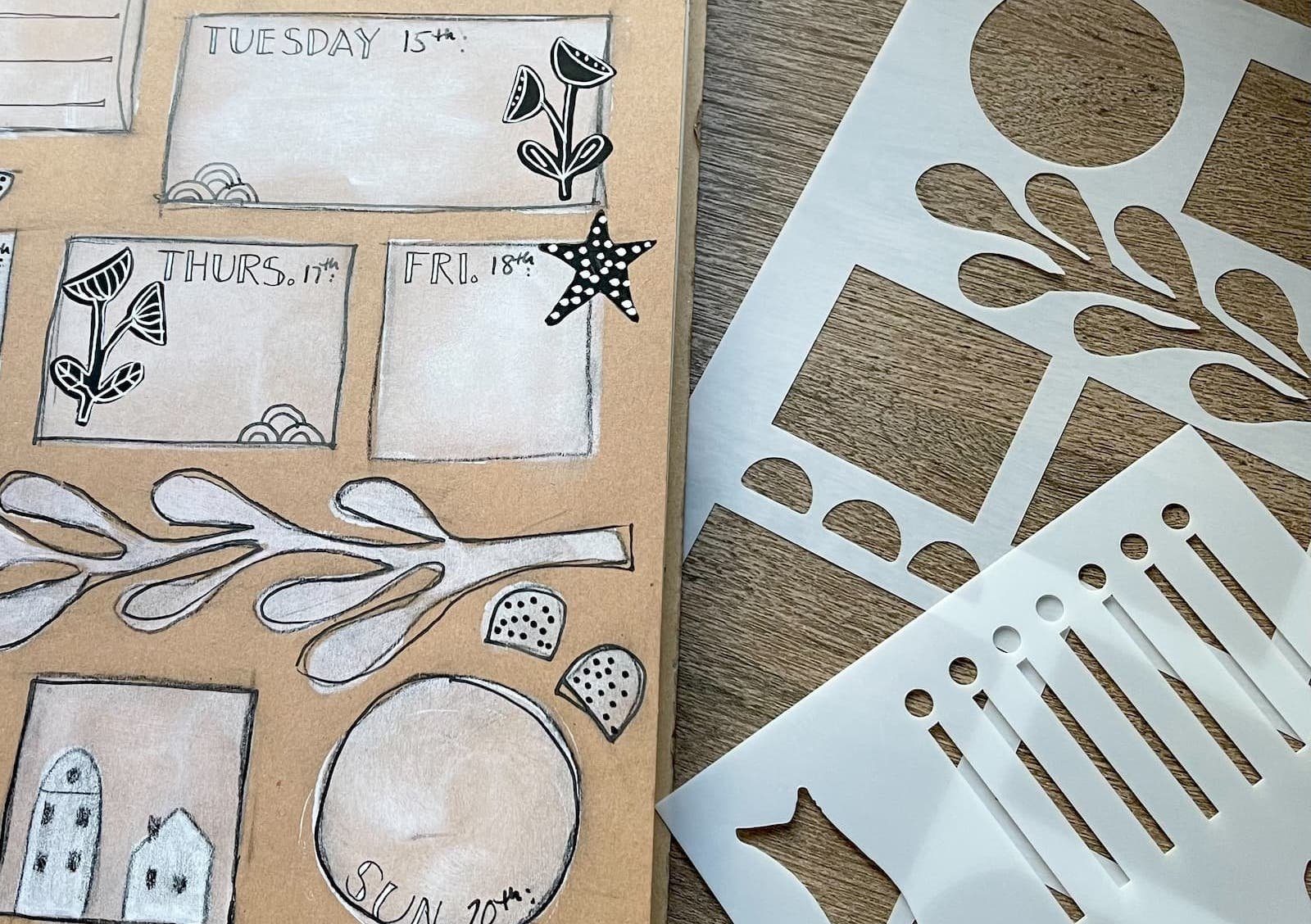 Laser-cut stencils on a hand-lettered planner
