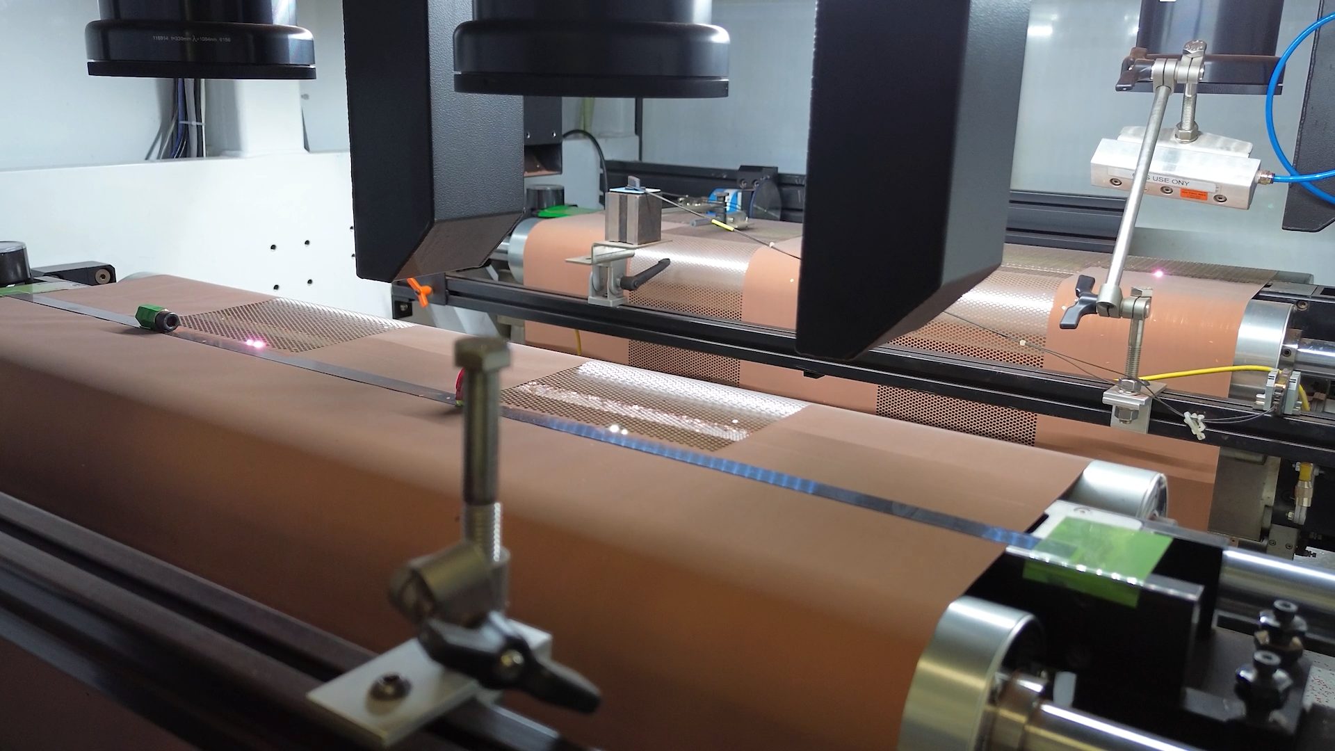 Copper foil web running through a laser converting line