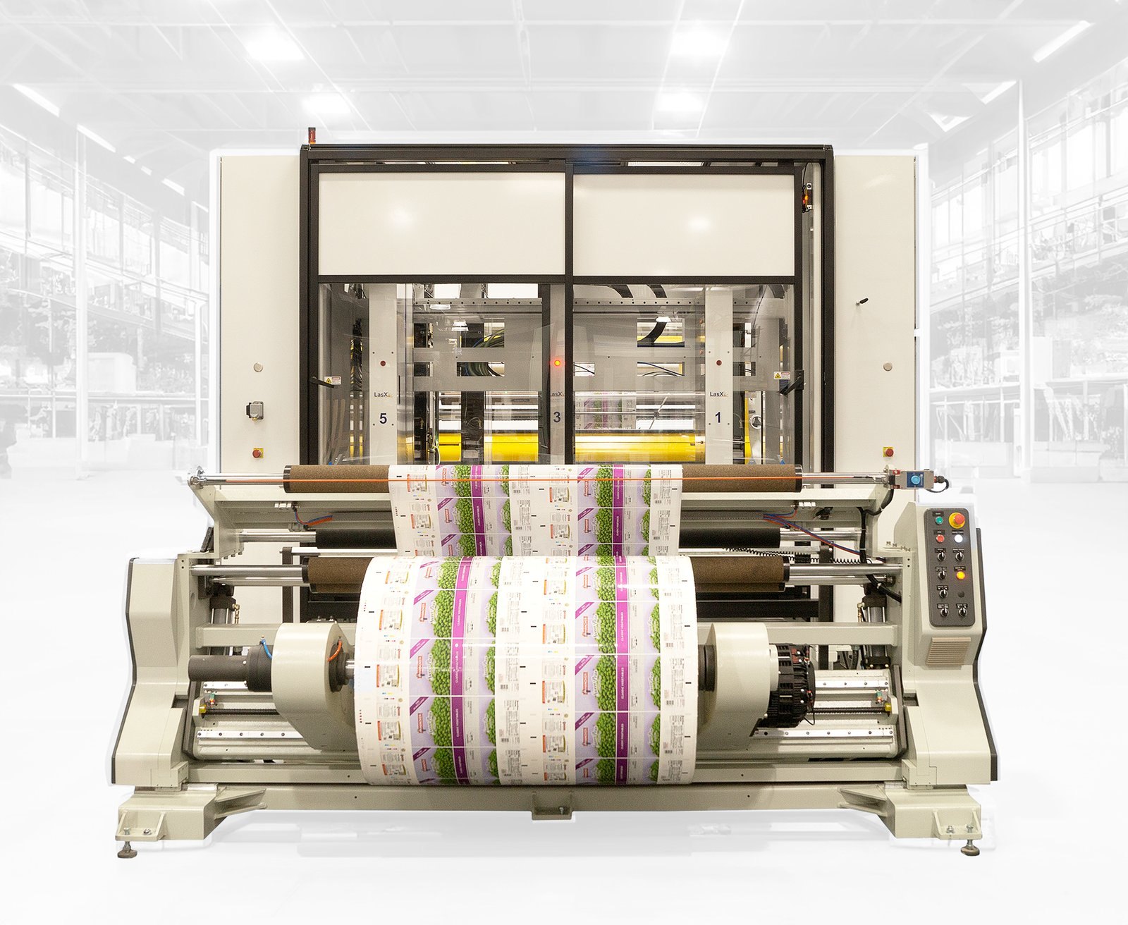 FocusPro roll-to-roll laser converting machine running a printed flexible packaging web through a five-module laser bank